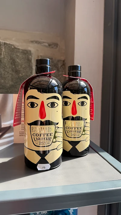 Two Kavalero Coffee Liqueur Bottles on a Shelf